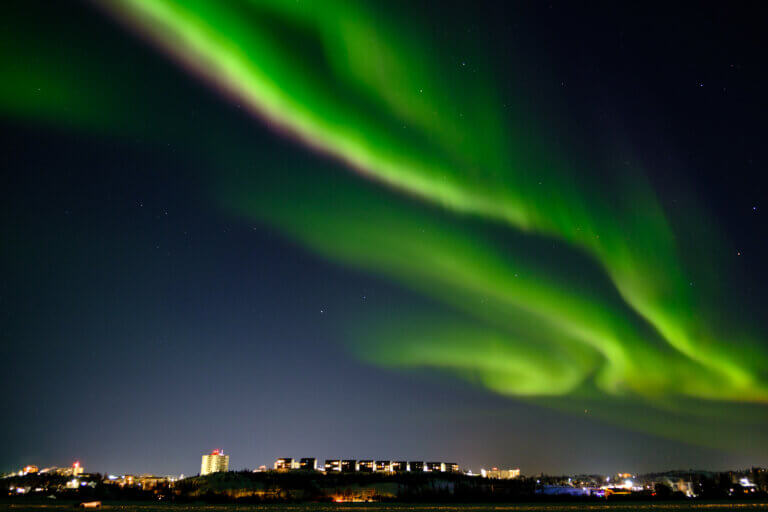 The northern lights dance over Yellowknife City, in the Northwest Territories, which offers some of the most enviable conditions in the world to observe them. PHOTO MARIE-SOLEIL DESAUTELS